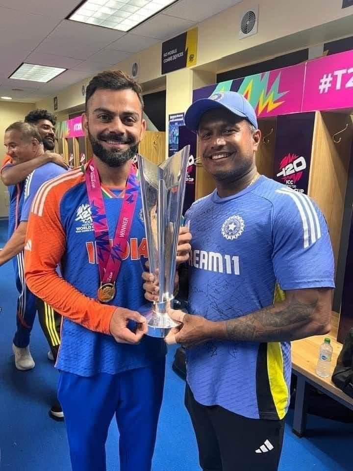 இலங்கையில் பஸ் ட்ரைவராக இருந்தவர் இன்று கோலியின் அருகில் உலகக்கோப்பையுடன்!  யார் இவர்?